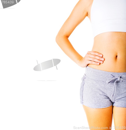 Image of Young Woman Working Out On White