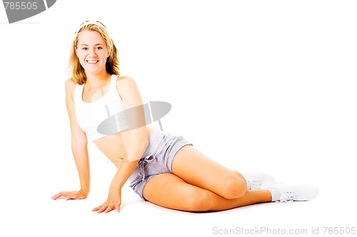 Image of Young Woman Working Out On White