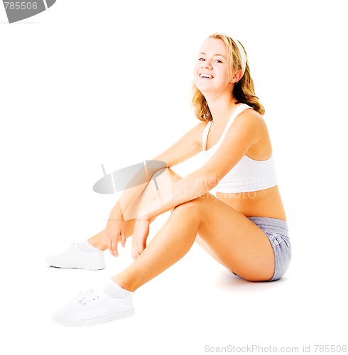 Image of Young Woman Working Out On White