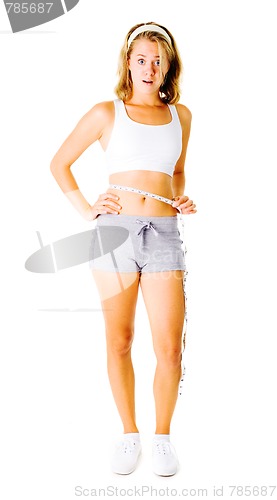 Image of Young Woman Measuring Herself On White