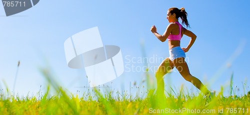 Image of Athletic Woman Exercising 