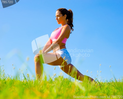 Image of Athletic Woman Exercising 