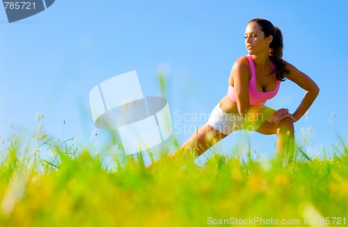 Image of Athletic Woman Exercising 