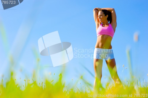 Image of Athletic Woman Exercising 