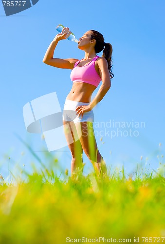 Image of Athletic Woman Exercising 