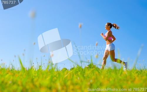 Image of Athletic Woman Exercising 