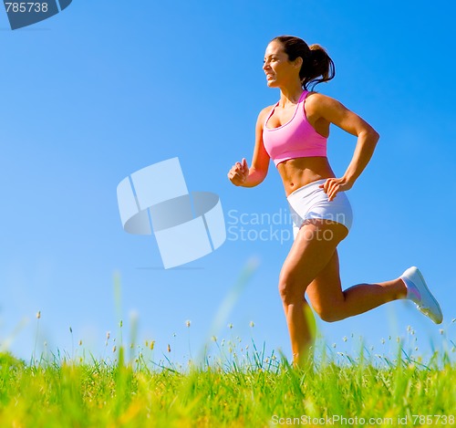 Image of Athletic Woman Exercising 