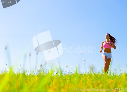 Image of Athletic Woman Exercising 