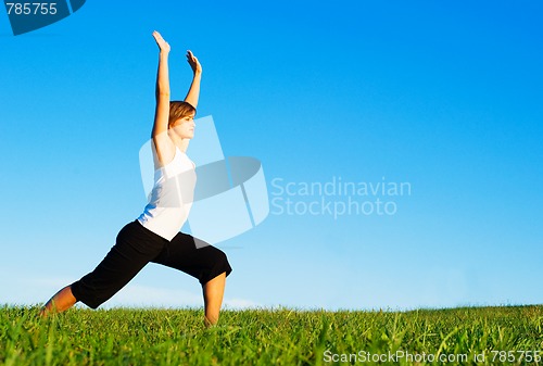 Image of Young Woman Doing Yoga