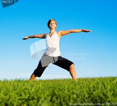 Image of Young Woman Doing Yoga