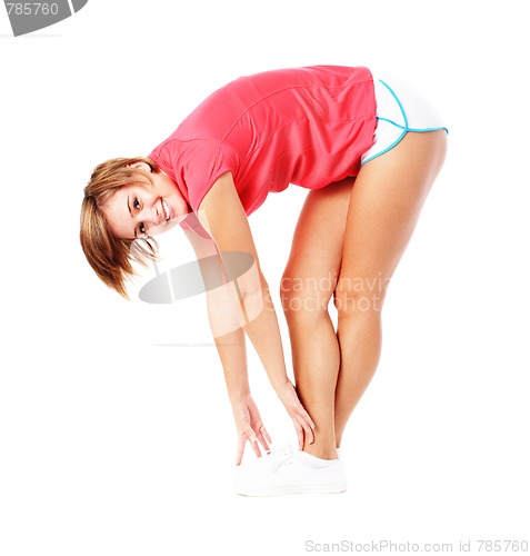 Image of Young Fitness Woman in Red Shirt Stretching, Isolated on White