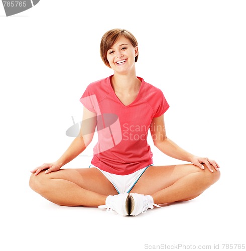 Image of Young Fitness Woman in Red Shirt Stretching, Isolated on White