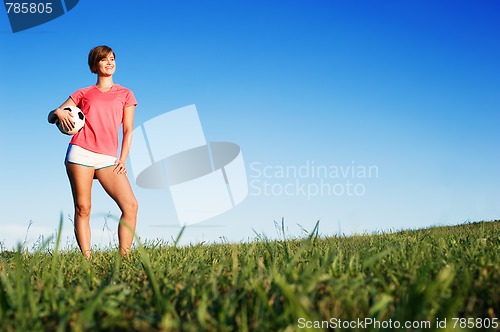 Image of Young Woman Playing Soccer