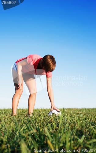 Image of Young Woman Playing Soccer