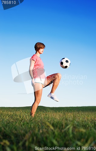 Image of Young Woman Playing Soccer