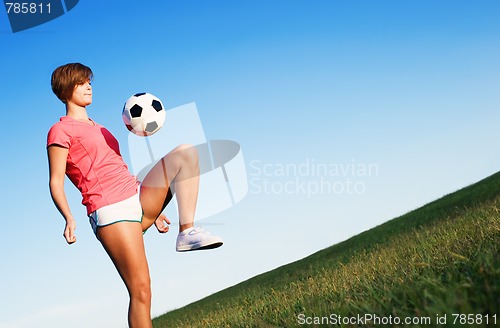 Image of Young Woman Playing Soccer