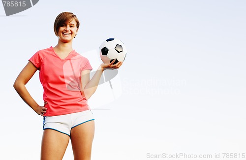 Image of Young Woman Playing Soccer