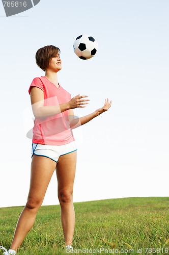 Image of Young Woman Playing Soccer