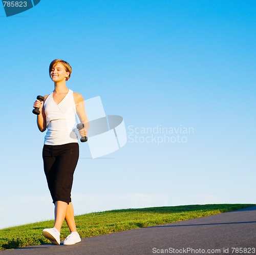 Image of Young Woman Walking