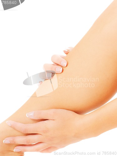 Image of Woman Massaging Leg