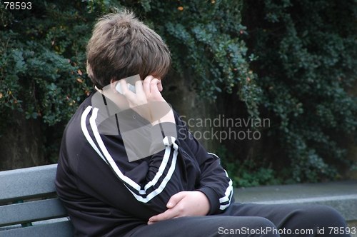 Image of Teen using cellphone