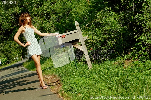 Image of Girl Checking Mail