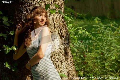 Image of Sexy Girl Against Tree