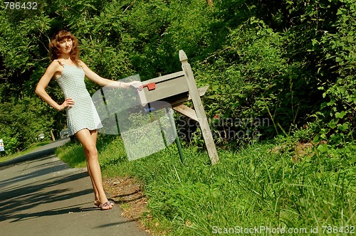 Image of Girl Checking Mail