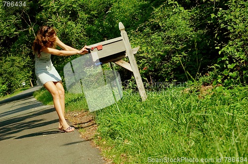 Image of Girl Checking Mail