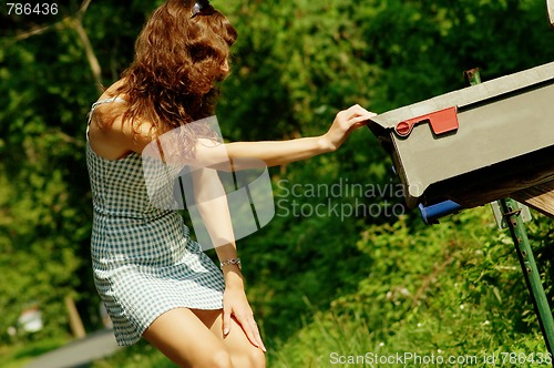 Image of Girl Checking Mail