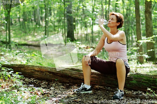 Image of Mature Woman Runner Resting