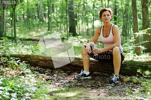 Image of Mature Woman Runner Resting