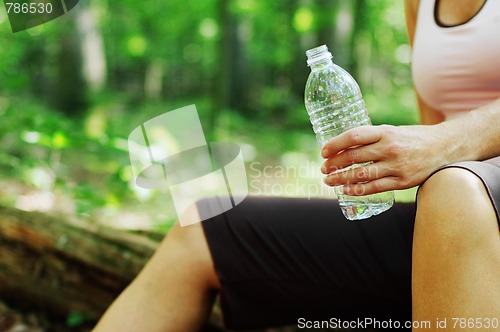 Image of Mature Woman Runner Resting