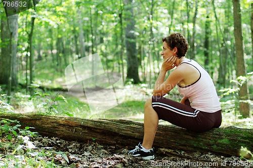 Image of Mature Woman Runner Resting