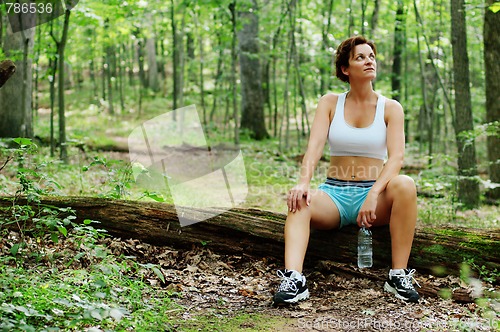 Image of Mature Woman Runner Resting