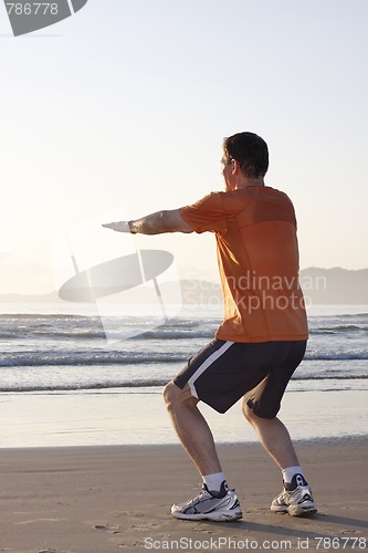 Image of Jogger doing squats