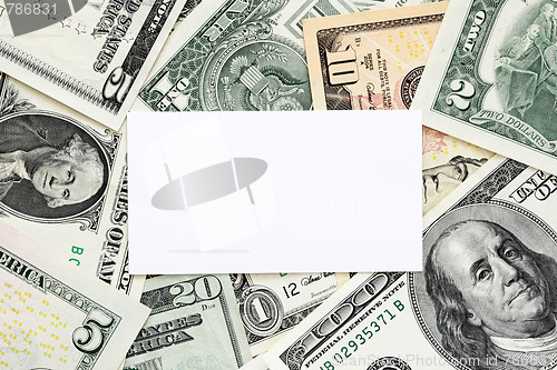 Image of Blank business card on money background