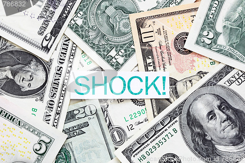 Image of Shock label on US dollar bills