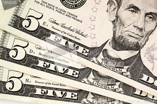 Image of Five dollar bills
