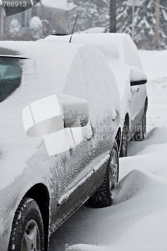 Image of Cars under winter storm.