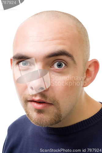 Image of face of mistrustful bold man