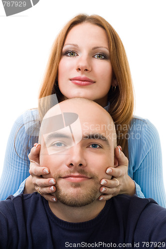 Image of positive woman touching men's head