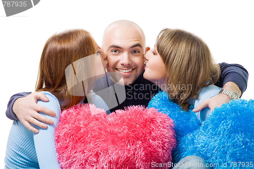 Image of Two woman kiss  man in cheeks