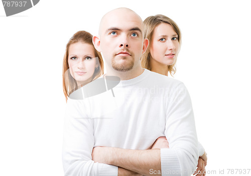 Image of positive young man with two women