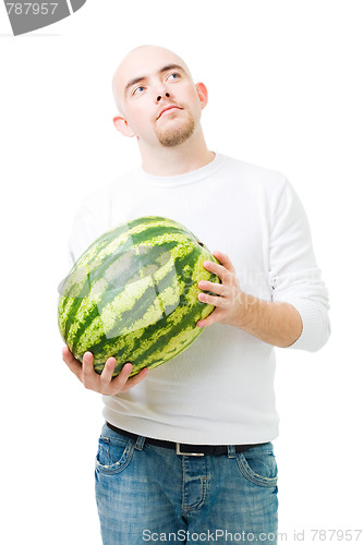 Image of Young man hold watermelon