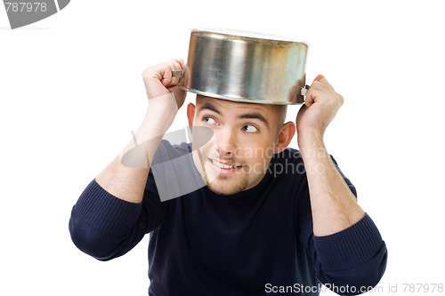 Image of Man afraid and protecting with casserole