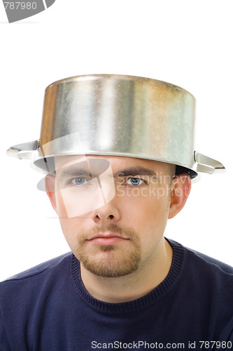 Image of  serious man with stew pan on head