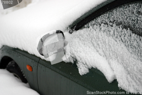 Image of Snow coverd car