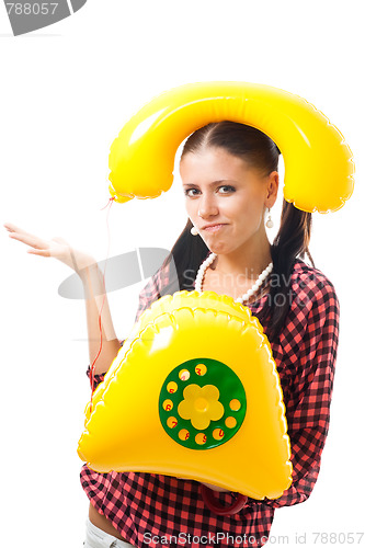 Image of Confused woman with telephone