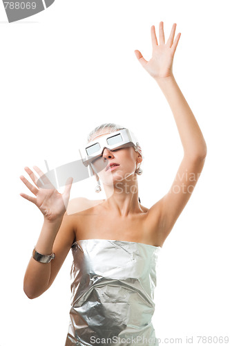 Image of Futuristic woman in virtural reality glasses